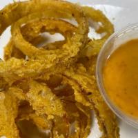 Onion Rings  · Golden House Made Onion Rings with dipping sauce