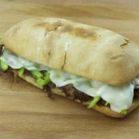 Philly Steak Sandwich · Sliced steak, green peppers, onions and cheese. Served with chips.