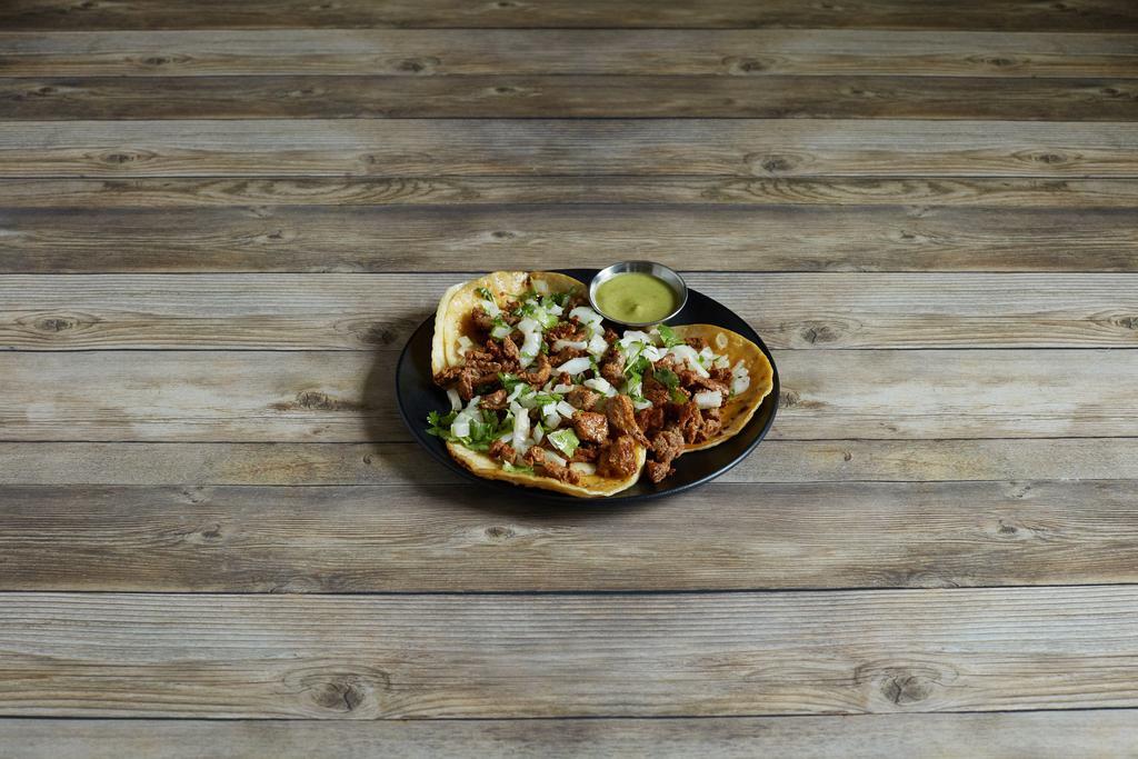 Street Tacos · Served with choice of steak, chicken, carnitas and chorizo. 3 folded corn tortillas filled with choice of meat. served with spicy tomatillo sauce, cilantro, onions and beans.