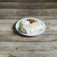 Burritos Grande · Choice of chicken, steak, chorizo, beef or pork stuffed with beans, rice and cheese, topped ...