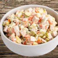 Olivieh Salad  سالاد الویه  · Potato salad with chicken, peas, eggs, dill pickles, carrots, and mayonnaise served with fre...