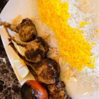 Lamb Chops شیشلیک · Marinated lamb chops grilled served with basmati rice with saffron grilled tomato, onion and...