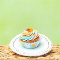Rainbow Buttercream Cupcake Vegan · A soft and sweet cupcake topped with rainbow buttercream. A vegan item that will fool your p...