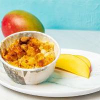 Mango & White Chocolate Bread Pudding · Enjoy fresh mangos mixed with the delicate balance of white chocolate for a one-of-a-kind br...