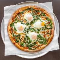 Eggs Florentine Pizza · Mozzarella, spinach, runny eggs.