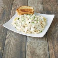 Chicken Alfredo · Alfredo sauce served over enriched spiral pasta and topped off with a generous portion of gr...