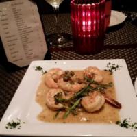 Garlic Shrimp · Jumbo shrimp sauteed in garlic and olive oil with lemon and capers.