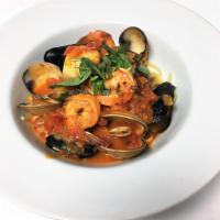 Linguini Frutti di Mare · Scallops, clams, mussels and shrimp with spicy light garlic tomato sauce.