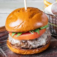 Salt Special Burger · 10 oz. American beef, white cheddar, red onions, salt burger sauce, and brioche bun.