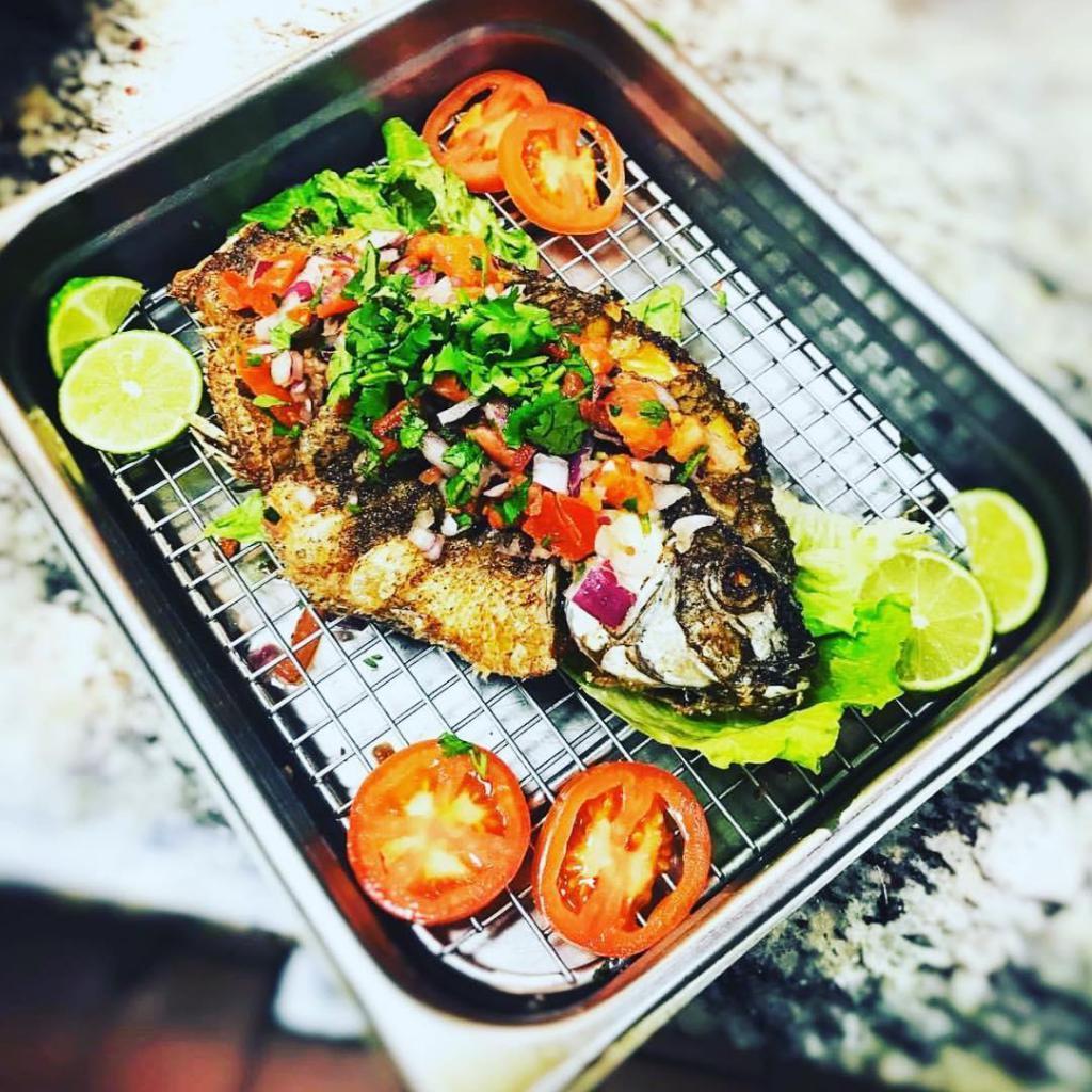 Fried Fish · Whole fried tilapia paired with your choice of 2 sides.
