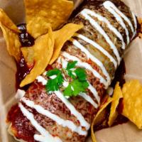  Wet Mole Burrito · Burrito regular de pollo banado con mole rojo y negro, queso y crema encima. Regular chicken...