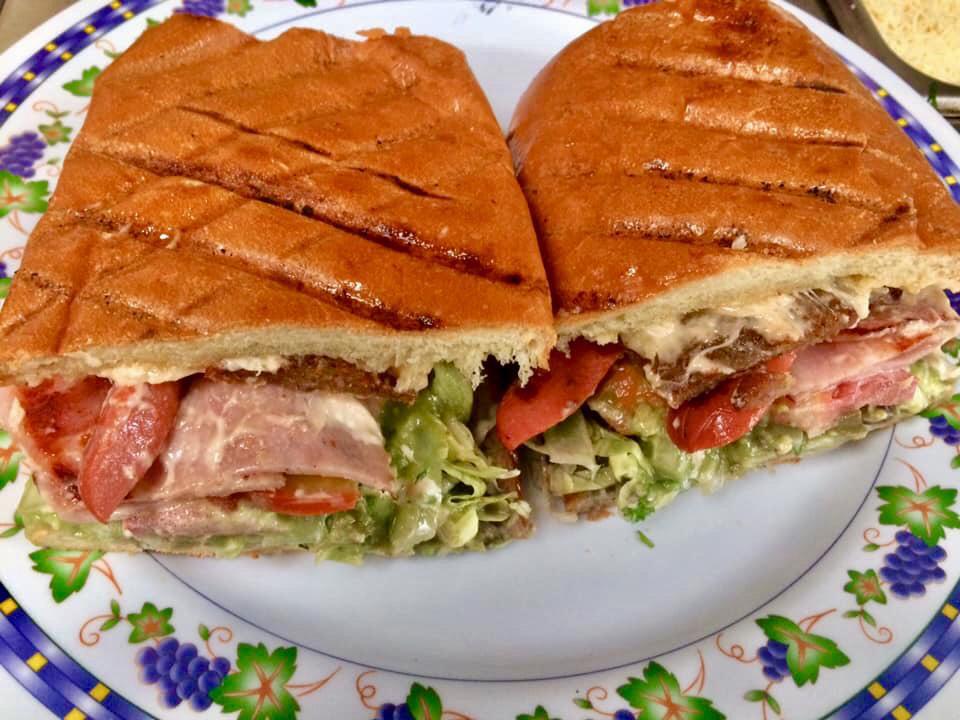 Panini(Torta) · Panini sandwich con carne, frijoles, mayonesa de chipotle,queso,guacamole, Lechuga, tomate y jalapeños(Panini Style Sandwich with choice of Meat, beans spread, melted cheese, chipotle aioli,lettuce, tomato, guacamole and jalapeños). Add fries for an additional charge.