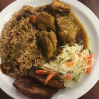 Curry Chicken Dinner · Serves with white rice or rice and peas veggies and plantains.