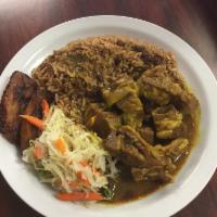 Curry Goat Dinner · Serves with white rice or rice and peas veggies and plantains 