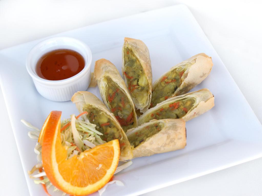 A2. 3 Chicken Chon Thai Rolls · Crispy rolls filled with ground chicken, onion, carrots, and potato served with sweet and sour sauce.