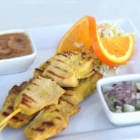 A3. 3 Chicken Satay · Grilled marinated chicken served with peanut sauce and cucumber sauce.