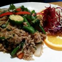 R2. Basil Fried Rice · Rice stir fried with choice of meat, egg, onion, bell peppers, chili, and basil.