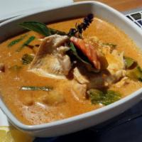 X3. Chicken Pumpkin Curry · Chicken with Thai pumpkin, veggies, and basil in red curry.