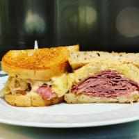 Pastrami Sandwich · Hot pastrami on rye bread or French baguette bread with mustard, tomato, lettuce, and Swiss ...