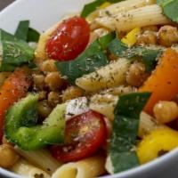 Vegan Penne · Our healthy pasta with chickpeas, tomatoes, garlic, green and orange paprika, basil. Portion...