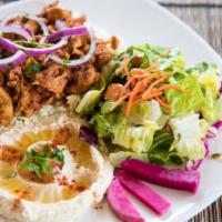 Chicken Shawarma · Sauteed strips of chicken, marinated in lemon juice, olive oil, spices and garlic sauce.