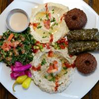 Combo Veggie Plate · Falafel, hummus, babaghannouj, tabouleh, 2 grape leaves, tahini (rice and salad not included).