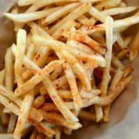 French Fries · Crispy thin-cut french fries topped with paprika