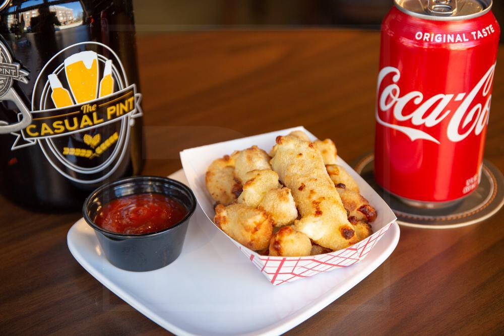 “Fried” Cheese Curds · Breaded Wisconsin white cheese curds served with your choice of ketchup, ranch or marinara.