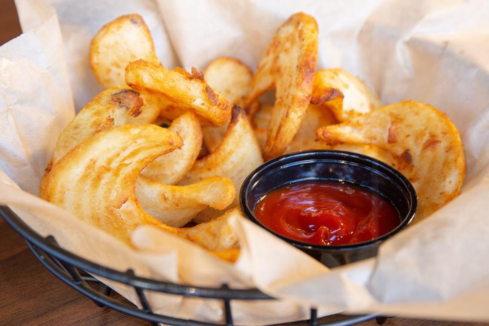 Sidewinders · Crispy beer-battered potatoes served with ketchup or ranch. Add beer cheese for an additional charge.