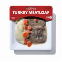 Turkey Meatloaf · Hearty with a healthful twist. Sliced turkey meatloaf with gravy and a side of red skinned m...