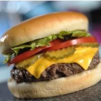 3. All American Cheeseburger  · Savor our classic, juicy big beef burger with melted American cheese, fresh tomato, crisp le...
