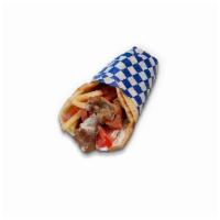 Pork Sandwich · Pork slices marinated in Greek spices. Wrapped in pita bread, with tzatziki sauce, tomatoes,...