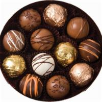 Mini Truffle Assortment · each truffle shell surrounds a soft chocolate filling made from the finest coverture chocola...