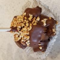 Snickers Caramel Apple · a Granny Smith apple covered in fresh caramel then covered with chunks of Snickers candy bar...