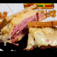 Ruby's Rueben Traditional Sub · Rueben - toasted sliced rye, corn beef, Thousand Island lettuce, tomato, onions, pickles, pe...