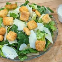 Caesar Salad · Fresh romaine hearts and parmesan cheese.  Oven-baked croutons and Caesar dressing on the si...