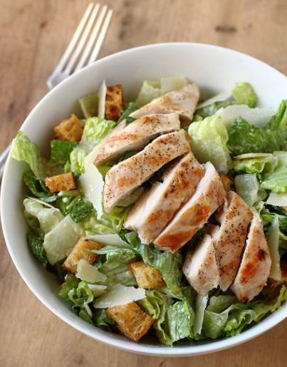 Chicken Caesar Salad · Fresh romaine hearts, oven baked chicken breast, and parmesan cheese. Oven-baked croutons and our special Caesar dressing on the side.