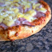 The Tide Pizza (HAM & Pineapple) #8 · Sweet Dole pineapple and shaved honey-baked hardwood smoked ham.