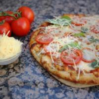 Real Pisano Pizza #9 · Fresh hand-tossed thin-crust lightly sauced with virgin olive oil and red marinara sauce, to...