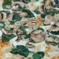 Tuscan Pizza #13 · Creamy white garlic sauce, mozzarella and Monterey jack cheese blend, mushrooms, fresh spina...