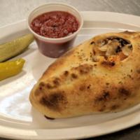 Calzone Garlic Chicken · Our fresh dough is filled with white creamy garlic sauce, tomatoes, red onions, mushrooms, r...