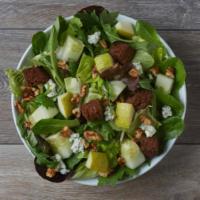 Ody's Toss Salad · Baby leaf and romaine greens, pears, walnuts, cucumbers, blue cheese, ginger dressing and pu...