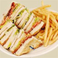 Club House Sandwich · Turkey, ham, bacon, tomato, lettuce and cheese.