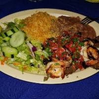 Carne Asada con Camarones Plato · Steak and shrimps. Served with rice, beans, salad and 2 tortillas.