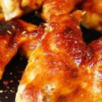 6 Whole Wings · Cooked wing of a chicken coated in sauce or seasoning.