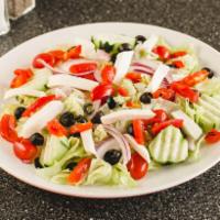 Italian Salad · Roasted peppers, fresh mozzarella, grilled chicken, tomatoes, cucumbers and black olives.