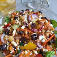 Vegetarian Deluxe Salad · Romaine and field greens, roasted peppers, Kalamata olives, feta, tomatoes, cucumbers, carro...