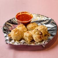Garlic Knots 6 Pieces · Popular. A classic snack, our garlic knots are strips of pizza dough tied in a knot, baked, ...