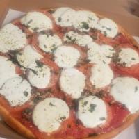 Margherita Pan Pizza · Pan style pizza with fresh mozzarella cheese, fresh basil, and homemade tomato sauce.