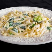 Fettuccini Alfredo · Fettuccini smothered in a delicious Alfredo parmesan creamy sauce made from scratch; choice ...